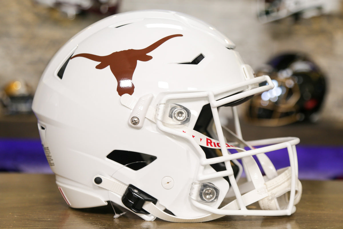 Texas' football helmets through the years