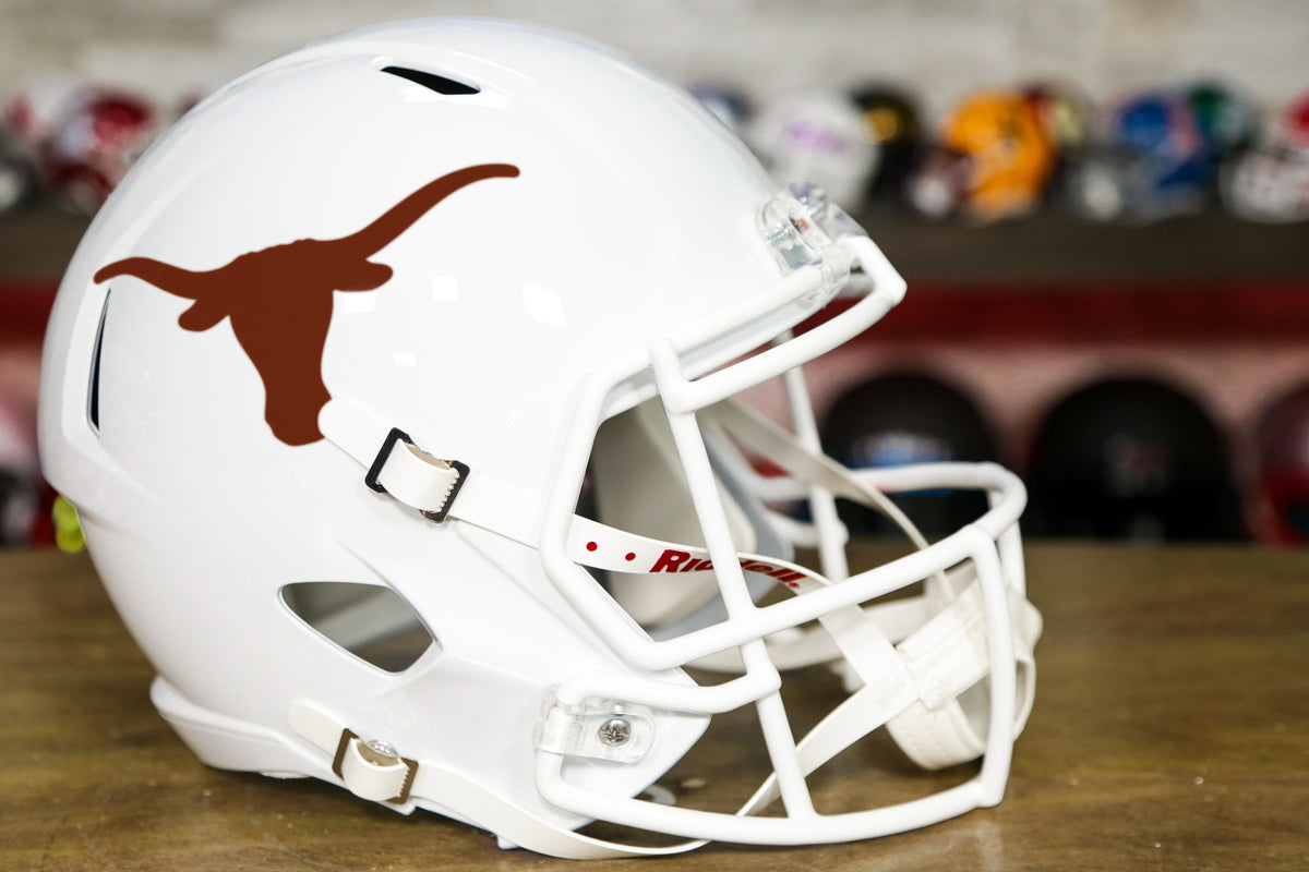 Texas' football helmets through the years